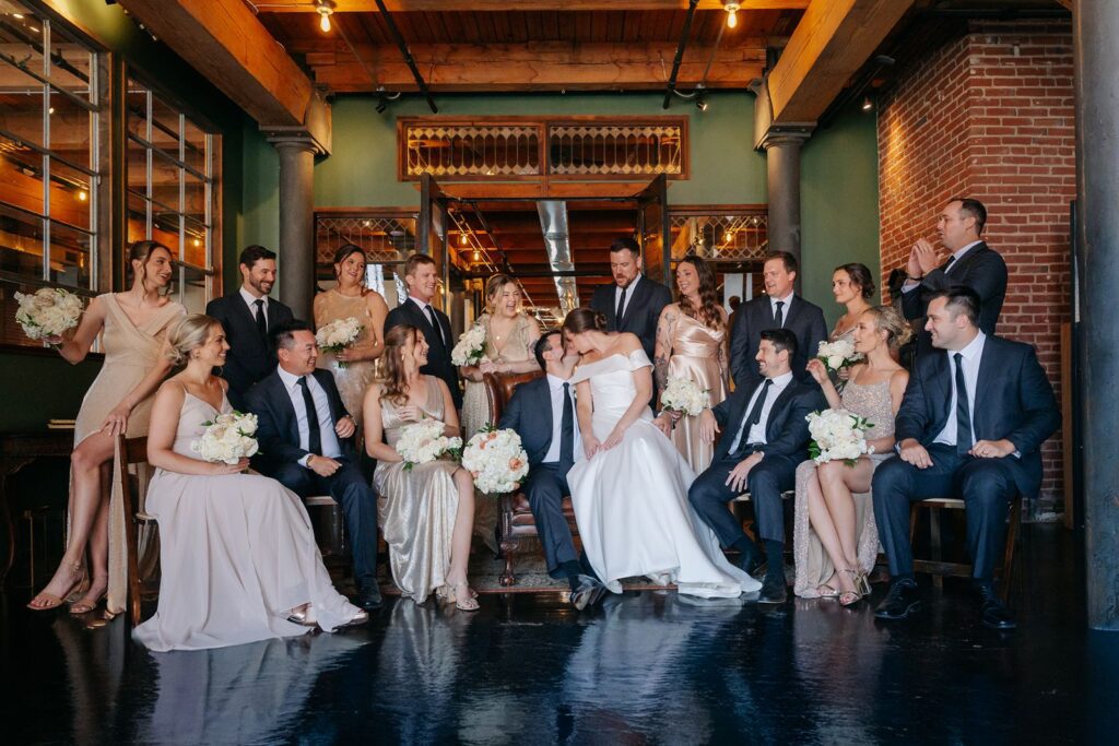 A bridal party poses for portraits at a Kansas City wedding venue