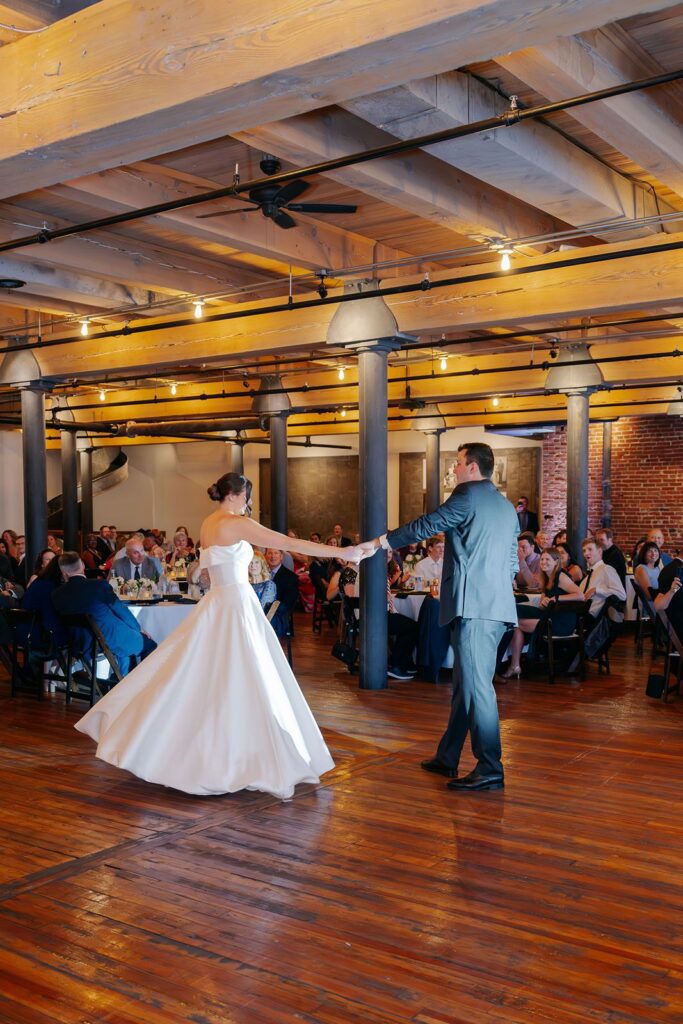 Bride and groom share a first dance at a kansas city wedding venue