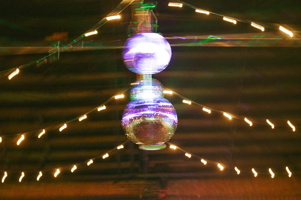 disco balls hang in the air