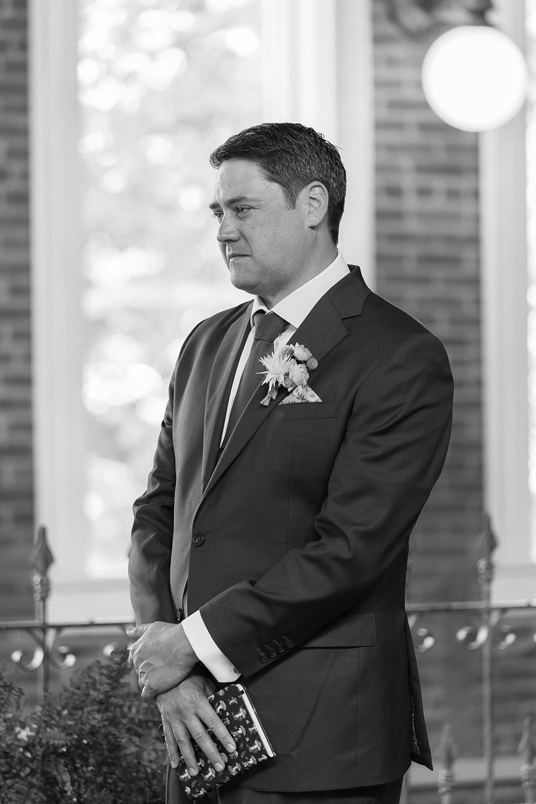 groom stands as bride reads vows